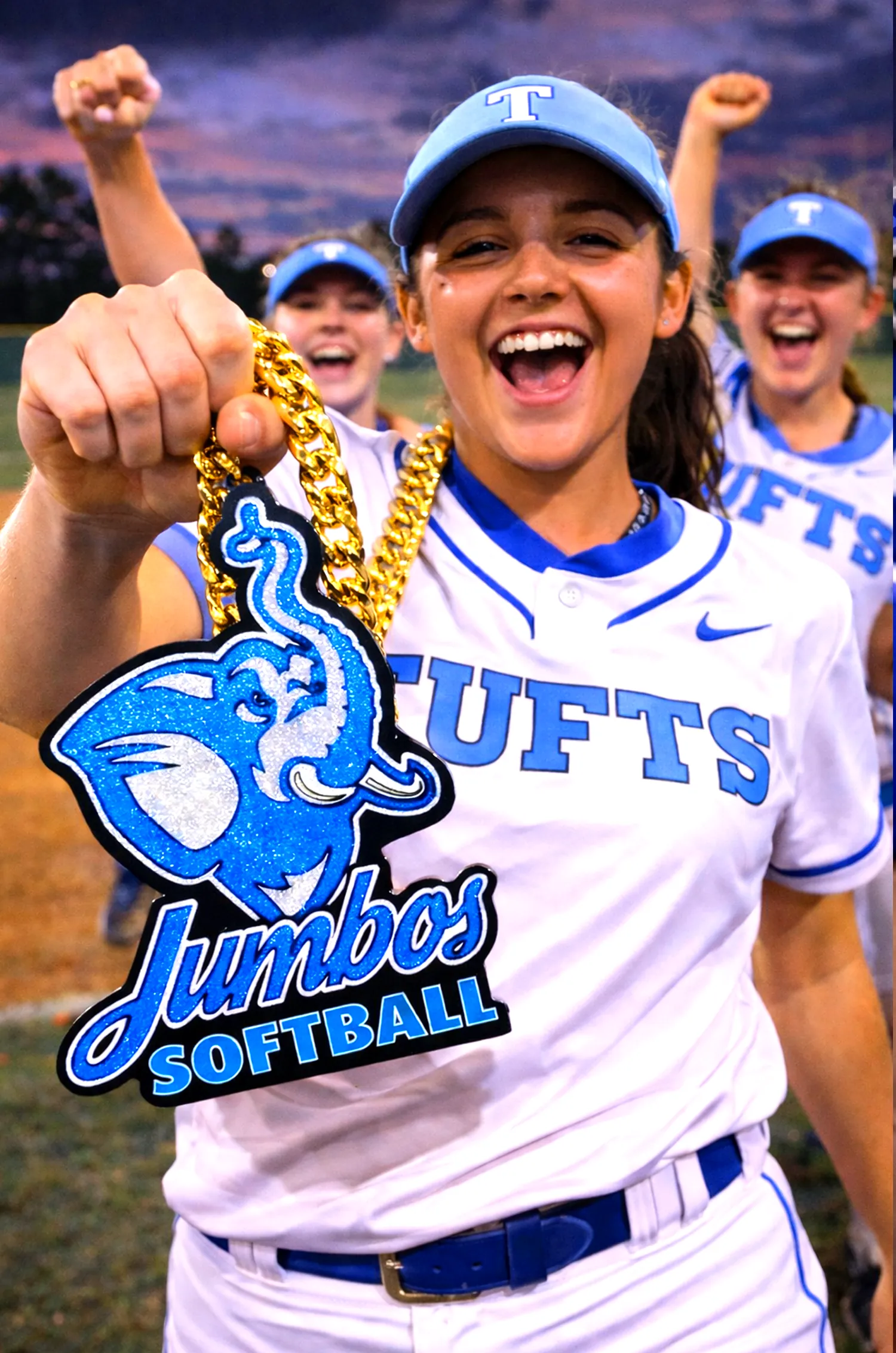 Softball player wearing a Jumbos pendant.