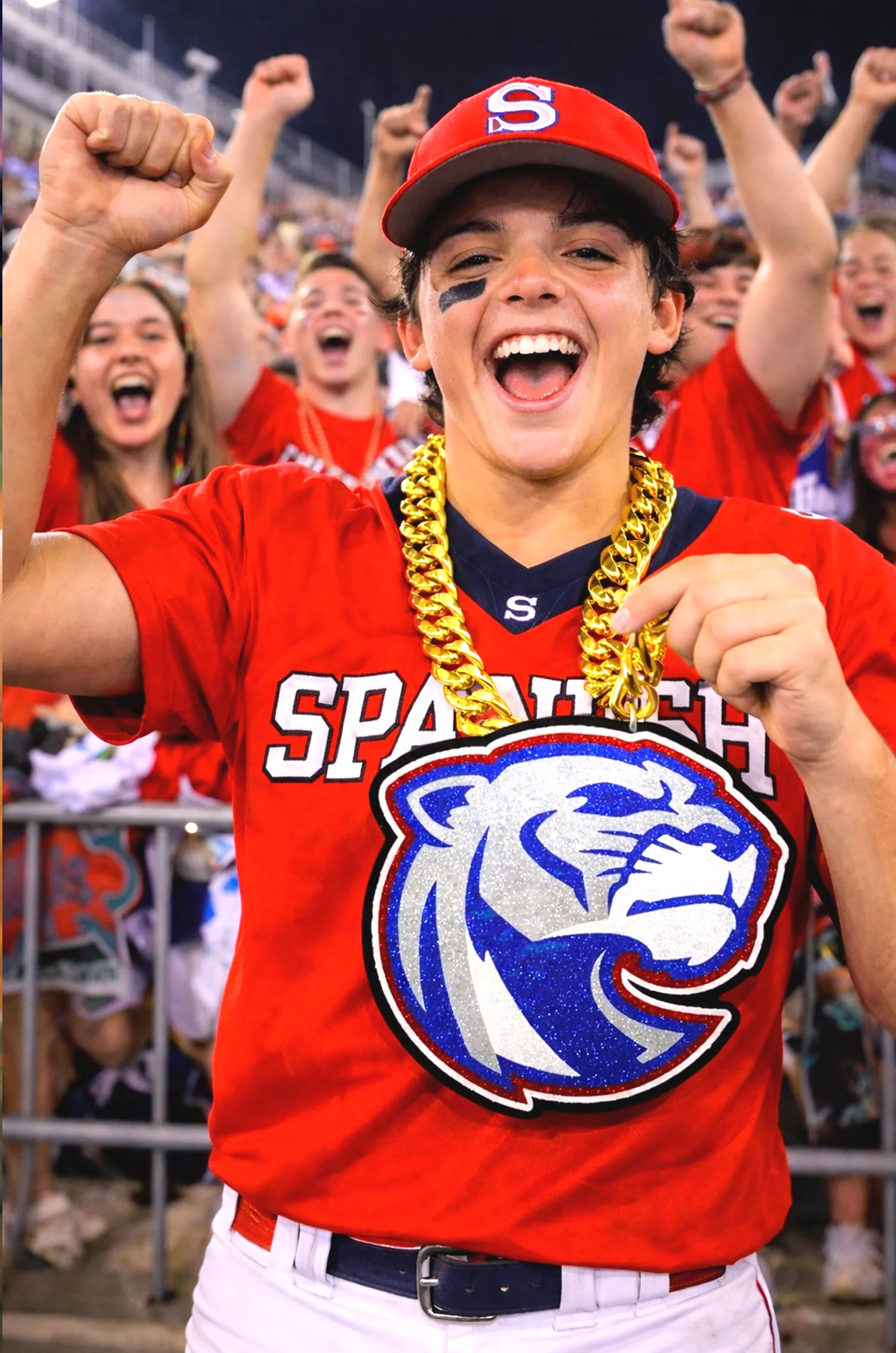Softball player wearing a Spartans team chain.