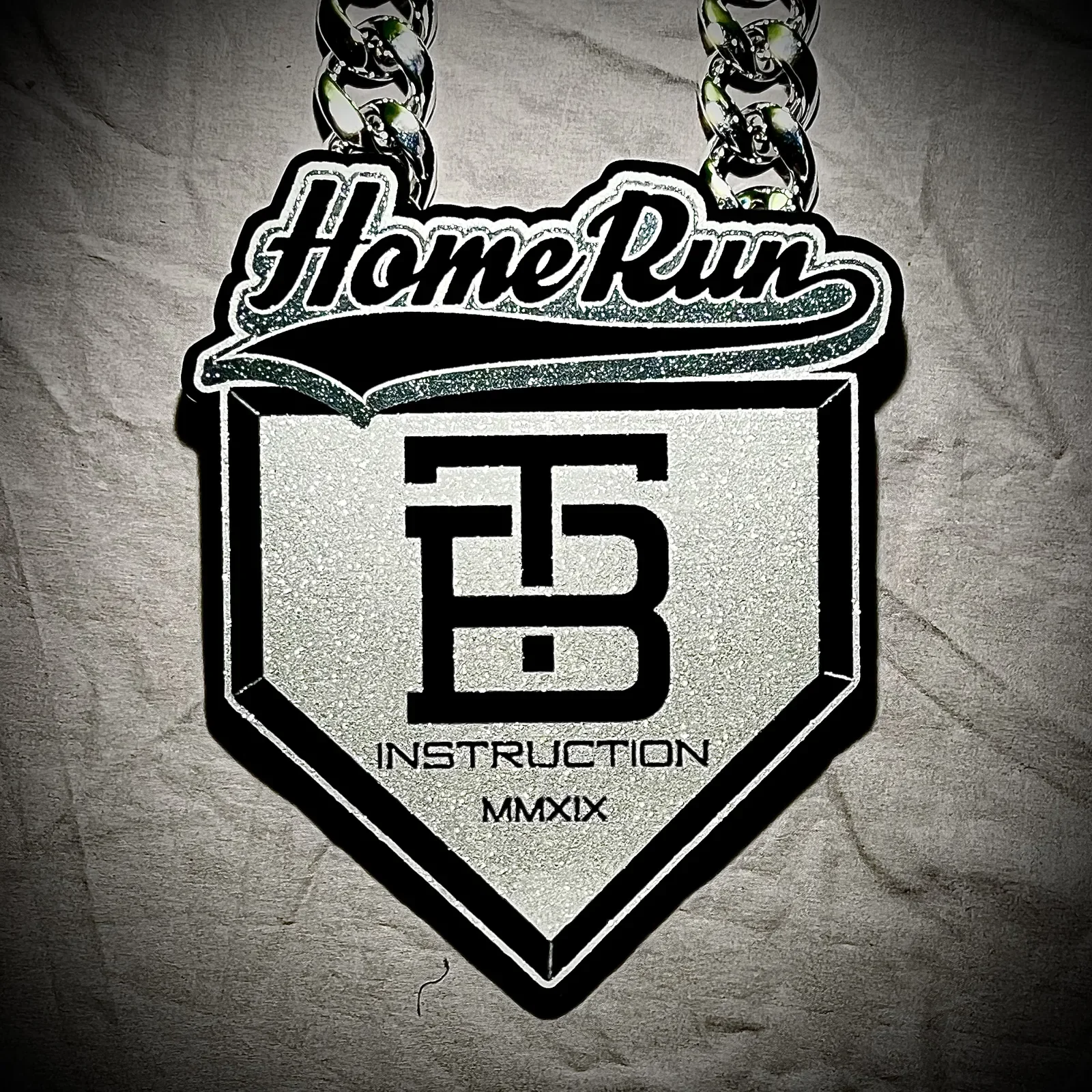 Baseball TB Instruction home run pendant.