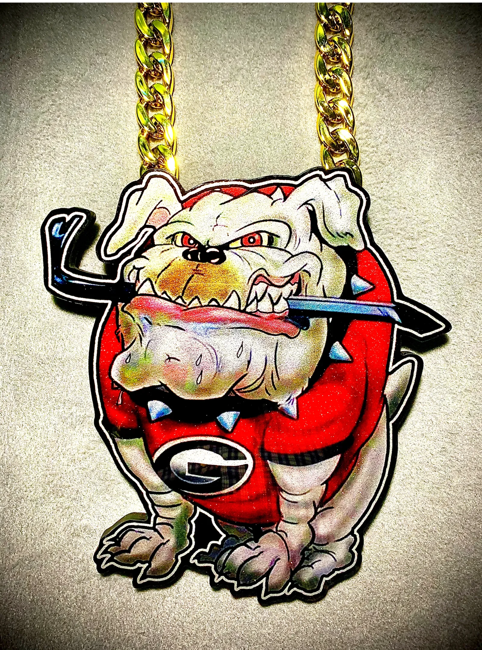 Georgia bulldog pendant with bold football styling.