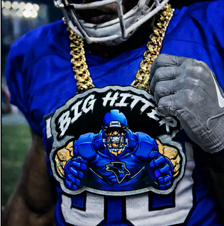 Football player wearing the Big Hitter chain.