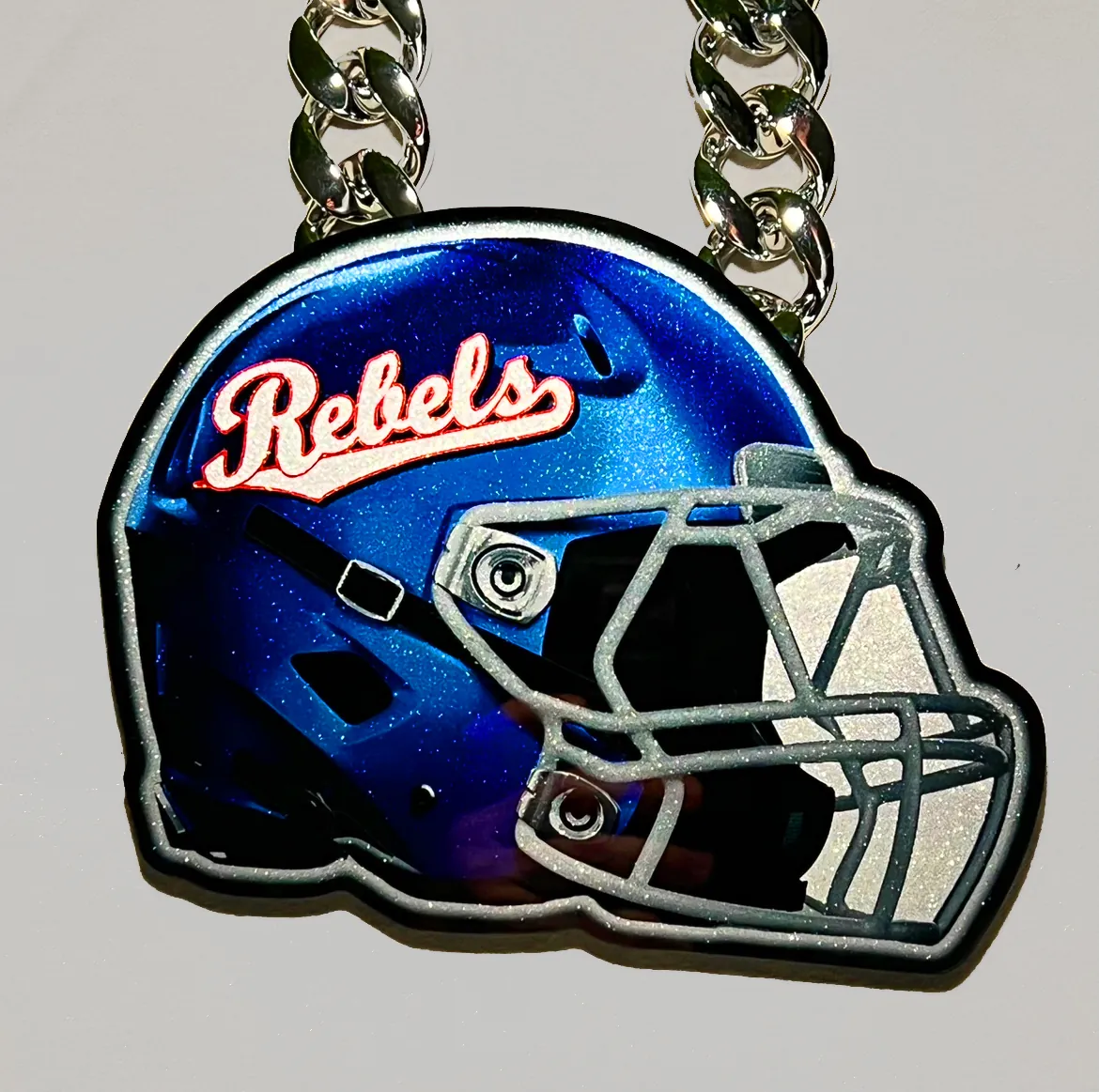 Football Rebels helmet pendant product shot.