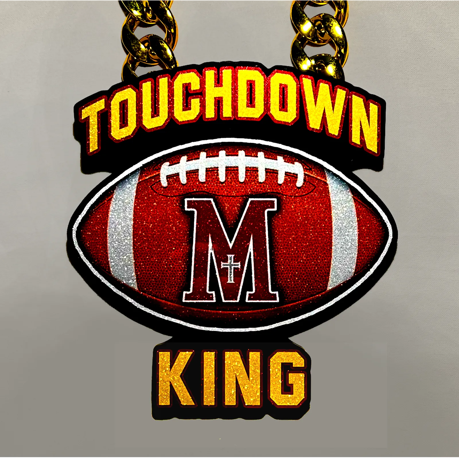 Touchdown King football pendant.