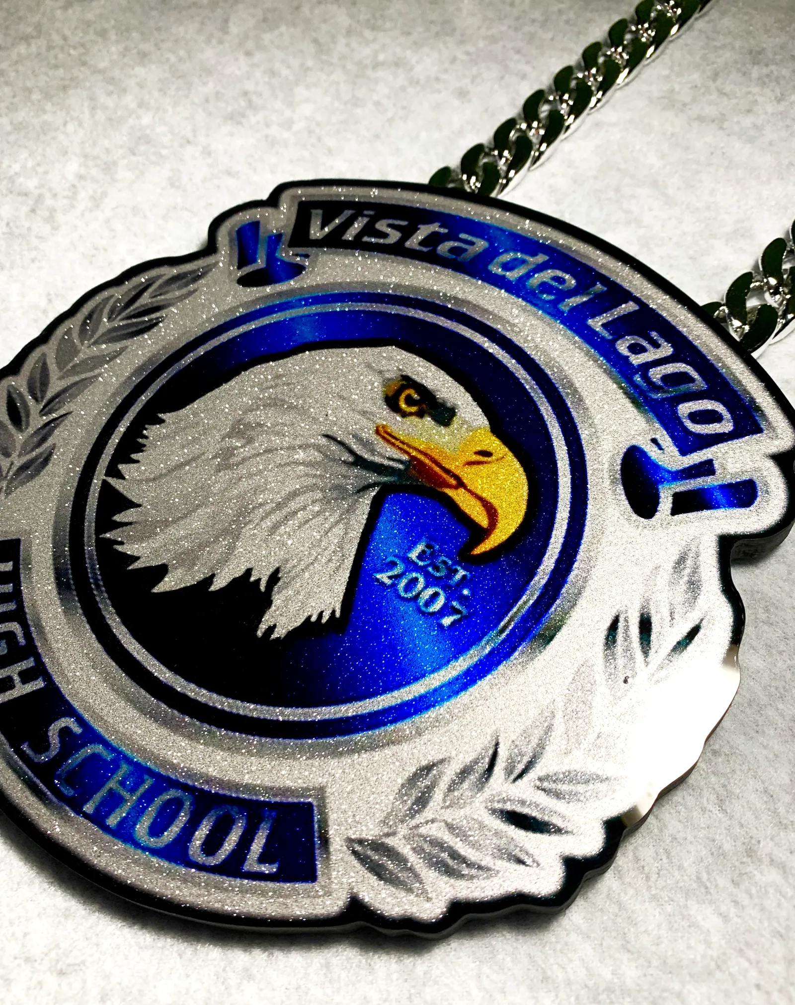 Vista del Lago Eagles text pendant.
